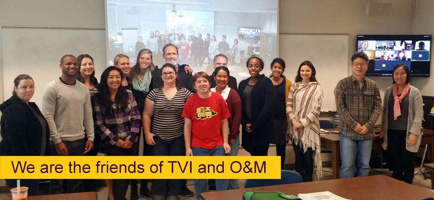 Group of people in a picture. Titled: "We are the friends of TVI and O&M"
